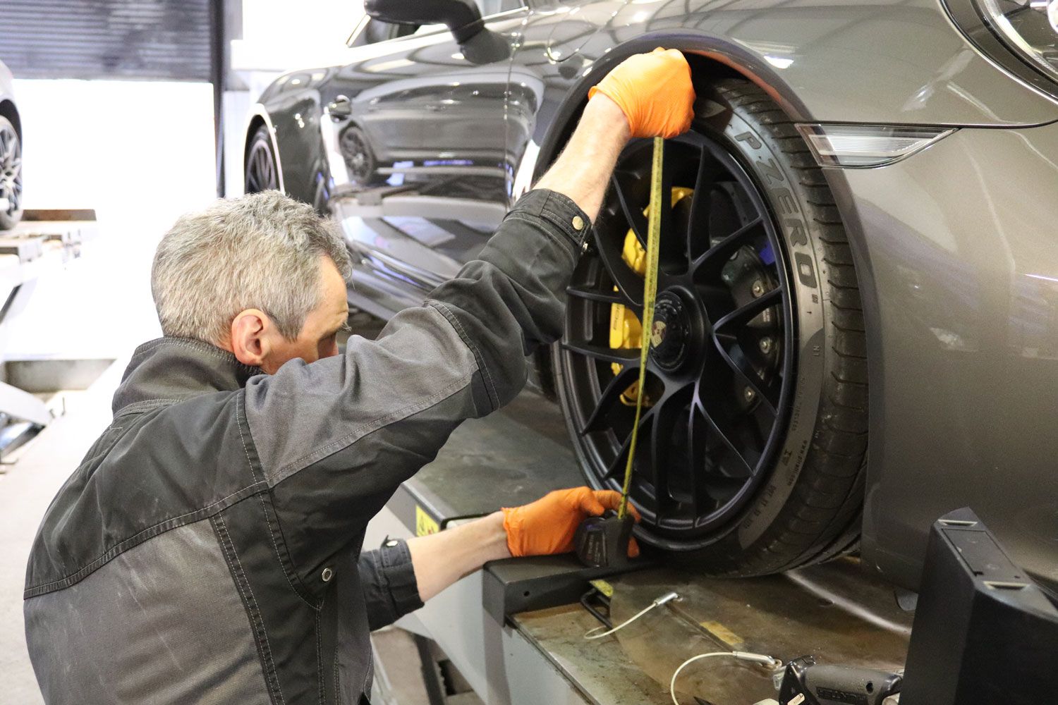 man at work on car